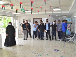 GR-12-Boys giving donation at Sharjah City for HumanitarianServices